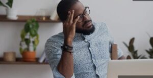 An entrepreneur carrying out a research if a business opportunity is legit or scam